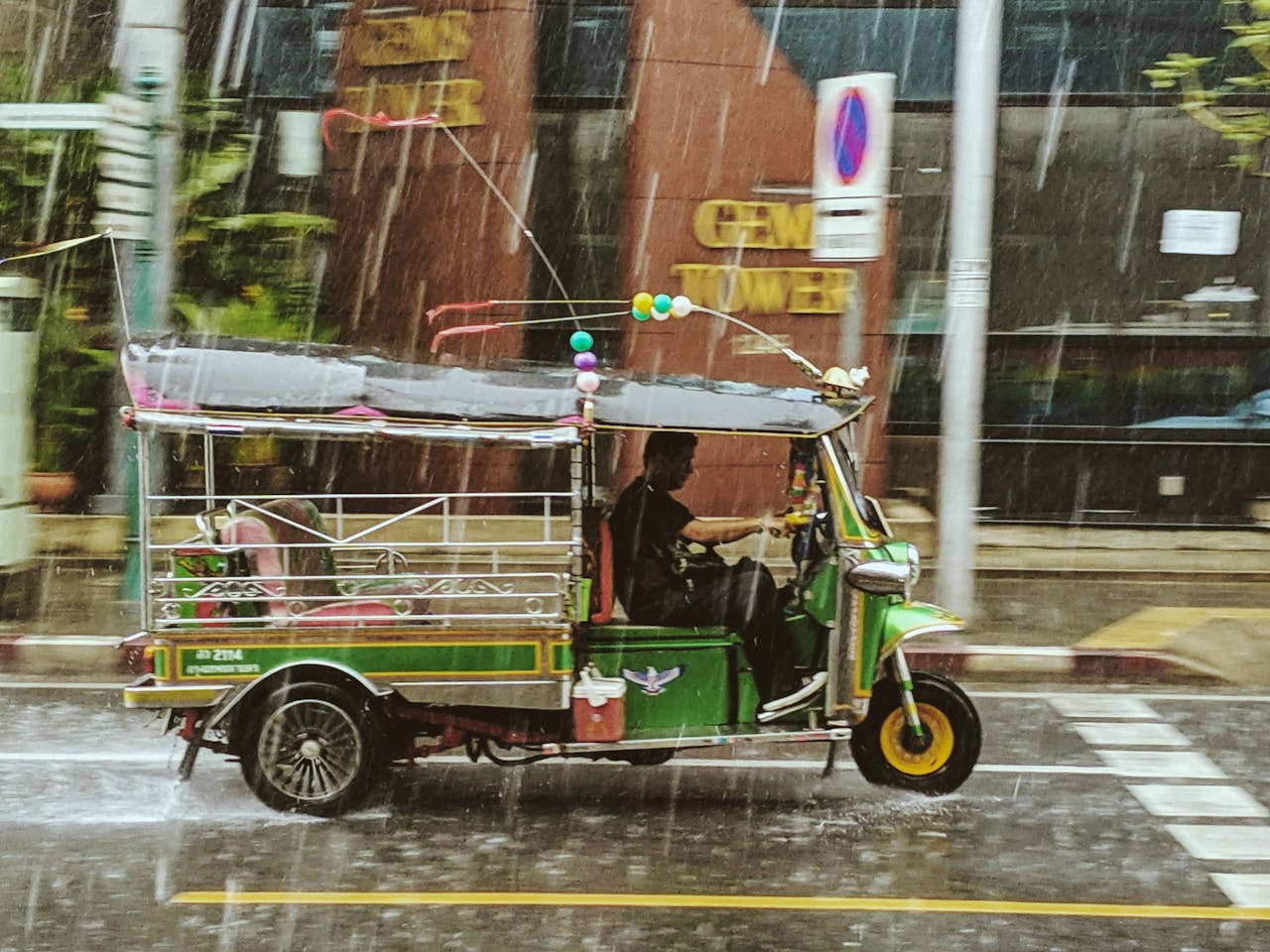 Tuk Tuk under the rain Thailand
